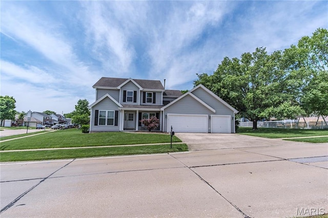 view of front of house with concrete driveway, an attached garage, and covered porch