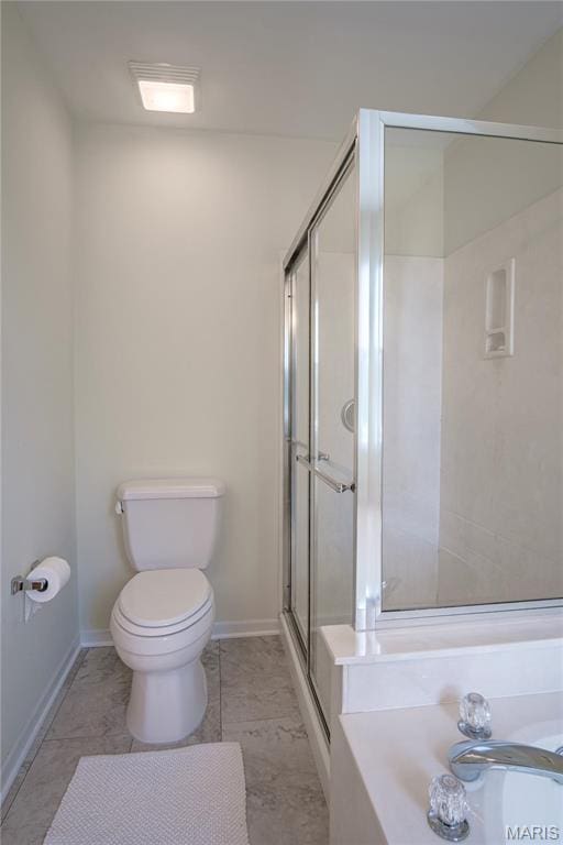 full bath with a stall shower, toilet, and baseboards