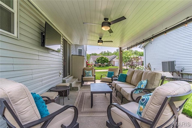 view of patio / terrace featuring an outdoor living space, entry steps, and a ceiling fan