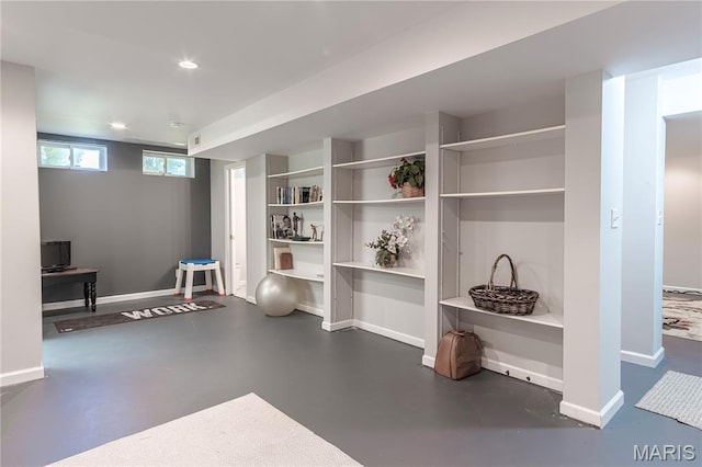 workout room with baseboards and recessed lighting