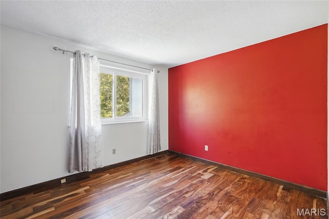 13112 Royal Pines Dr, Saint Louis, MO 63146 - unfurnished room with wood finished floors and a textured ceiling