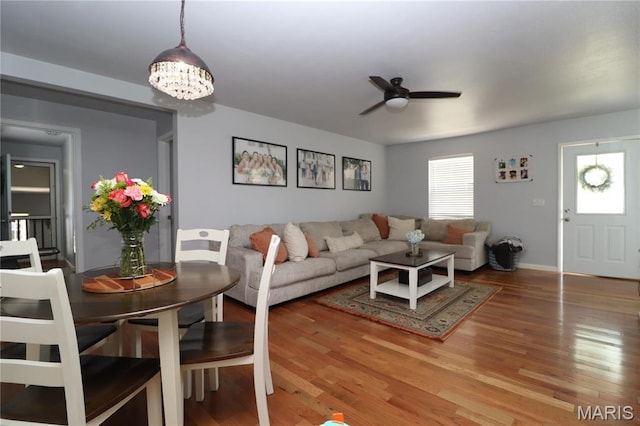 424 Shellview St, Bethalto, IL 62010 - living area with ceiling fan, wood finished floors, baseboards, and a chandelier