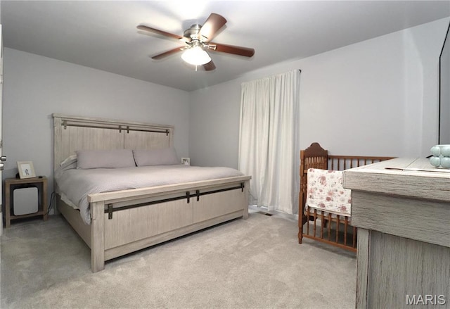 424 Shellview St, Bethalto, IL 62010 - bedroom with light colored carpet and ceiling fan