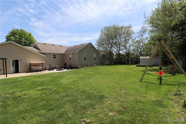 424 Shellview St, Bethalto, IL 62010 - view of yard featuring a patio area and a fire pit