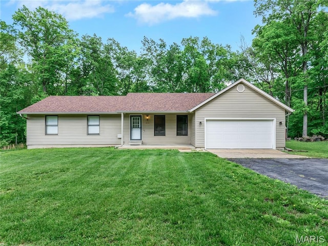ranch-style home featuring a garage, asphalt driveway, a front yard, and covered porch