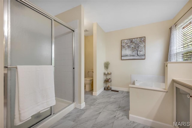 7302 Macleod Ln, Ofallon, MO 63368 - bathroom with a shower stall, marble finish floors, toilet, and baseboards
