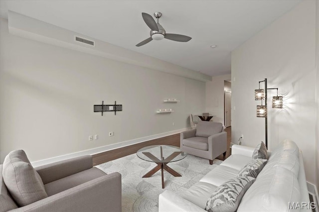 9 N Euclid Ave Unit 411, Saint Louis, MO 63108 - living area featuring a ceiling fan, wood finished floors, and baseboards