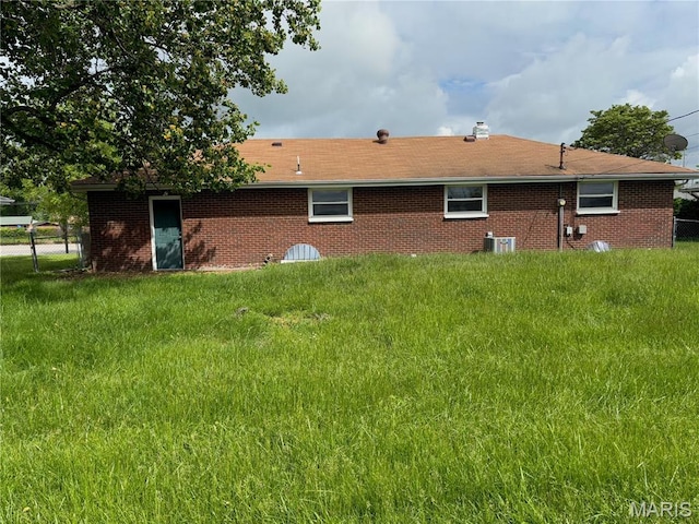7208 Montclair, Godfrey, IL 62035 - rear view of property featuring brick siding