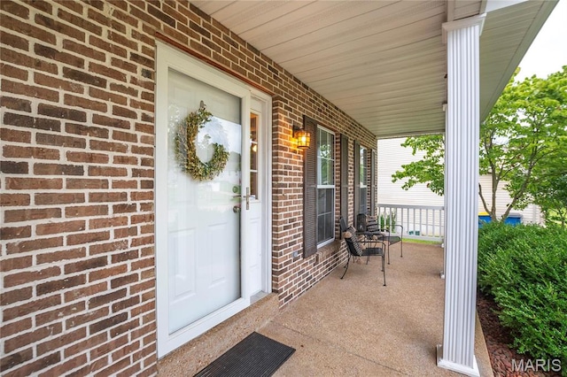 1408 Glacier Pass, Festus, MO 63028 - view of exterior entry featuring a porch and brick siding