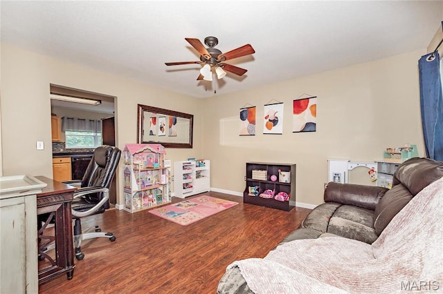 1408 Glacier Pass, Festus, MO 63028 - living room with ceiling fan, wood finished floors, a desk, and baseboards