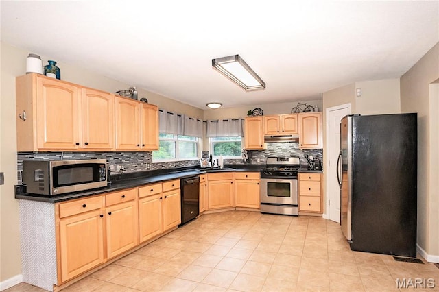 1408 Glacier Pass, Festus, MO 63028 - kitchen with stainless steel appliances, light brown cabinetry, decorative backsplash, a sink, and dark countertops