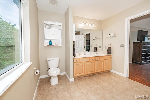 1408 Glacier Pass, Festus, MO 63028 - full bathroom with toilet, double vanity, tile patterned floors, and baseboards