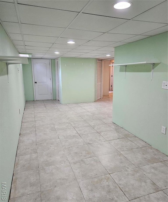 empty room featuring light tile patterned floors and recessed lighting