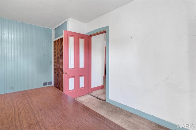 unfurnished room with carpet floors