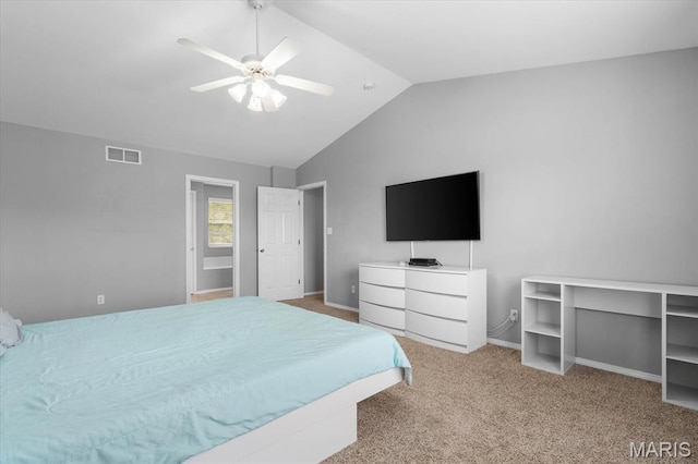 carpeted bedroom featuring lofted ceiling, ceiling fan, and baseboards