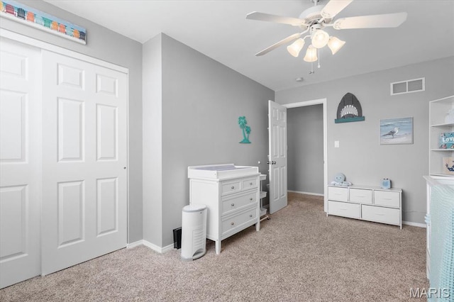 bedroom with carpet flooring, baseboards, and ceiling fan