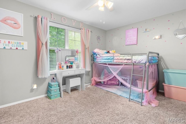 bedroom featuring carpet floors, baseboards, and ceiling fan