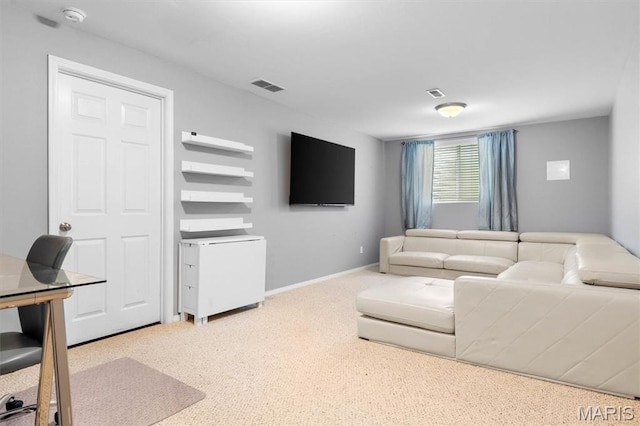 living room featuring carpet flooring and baseboards