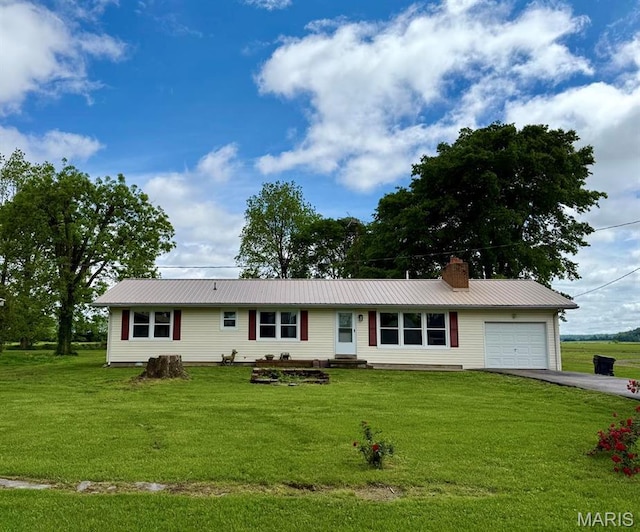 25804 State Highway O, Bell City, MO 63771 - ranch-style house with asphalt driveway, an attached garage, a chimney, metal roof, and a front yard