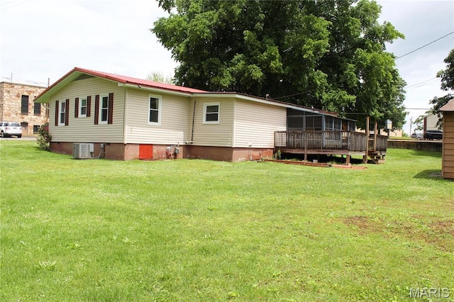 206 E Spring St, Doniphan, MO 63935 - back of house featuring a lawn, crawl space, and a sunroom