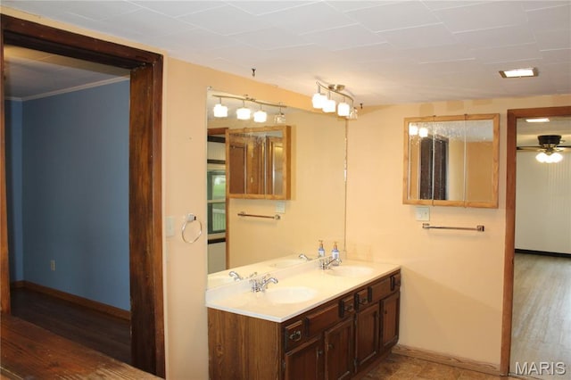 206 E Spring St, Doniphan, MO 63935 - bathroom with double vanity and ceiling fan