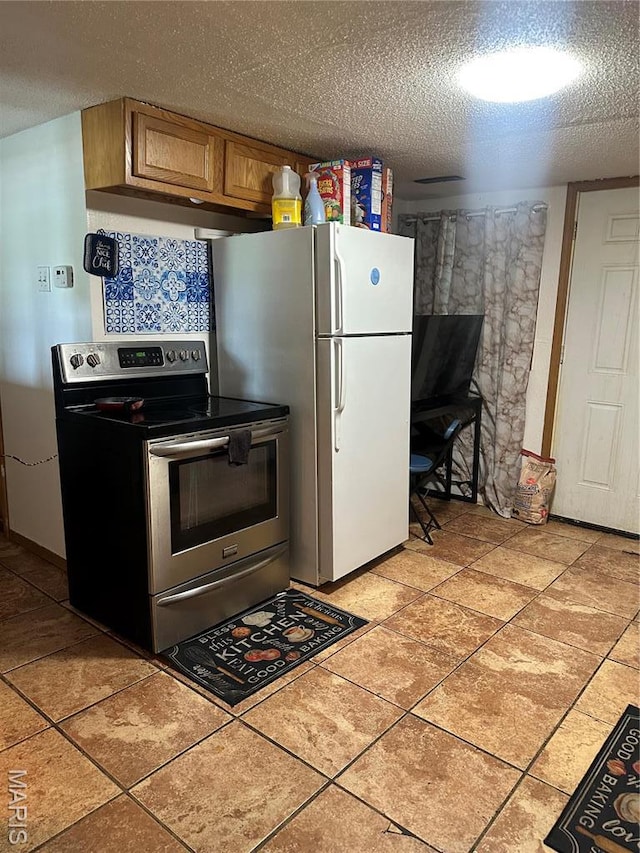 514 N 48th St E, St Louis, IL 62205 - kitchen featuring stainless steel range with electric stovetop, a textured ceiling, brown cabinetry, under cabinet range hood, and light tile patterned floors