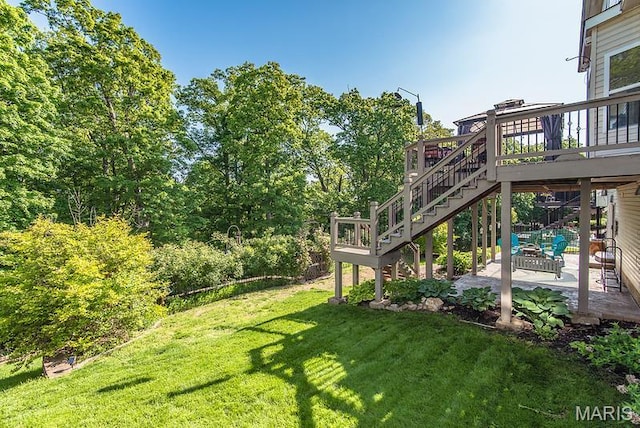 346 Palisades Ridge Ct, Eureka, MO 63025 - view of green lawn featuring a patio area, a deck, and stairs