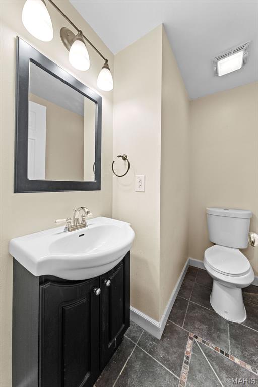 1102 Danielle Elizabeth Ct, Ofallon, MO 63366 - half bath with vanity and tile patterned floors