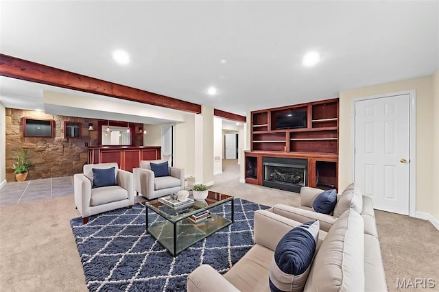 1102 Danielle Elizabeth Ct, Ofallon, MO 63366 - carpeted living area with a fireplace, recessed lighting, and beam ceiling