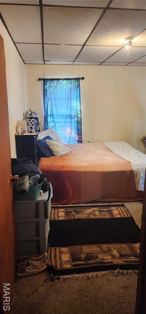 bedroom featuring a paneled ceiling