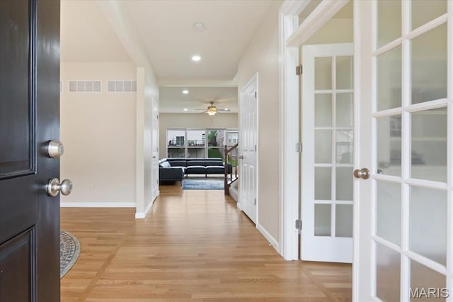 1417 Red Oak Plantation Dr, Ballwin, MO 63021 - entryway with light wood-type flooring, baseboards, recessed lighting, ceiling fan, and french doors