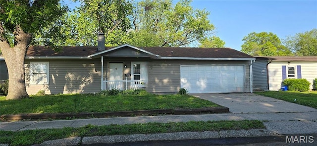 2820 Birch Ave, Granite City, IL 62040 - ranch-style house featuring a garage, concrete driveway, and a chimney