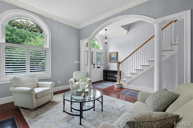 1606 Mississippi Ave, Saint Louis, MO 63104 - living room with healthy amount of natural light, wood finished floors, ornamental molding, and baseboards