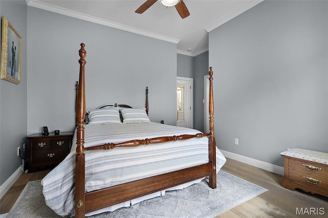 1606 Mississippi Ave, Saint Louis, MO 63104 - bedroom featuring baseboards, wood finished floors, crown molding, and ceiling fan