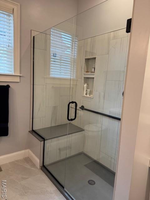1606 Mississippi Ave, Saint Louis, MO 63104 - full bath with baseboards and a shower stall