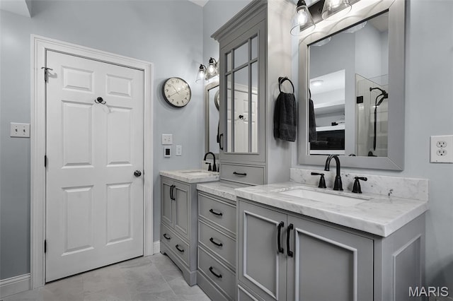 1606 Mississippi Ave, Saint Louis, MO 63104 - bathroom featuring double vanity and baseboards