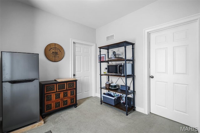 1606 Mississippi Ave, Saint Louis, MO 63104 - miscellaneous room featuring carpet and baseboards