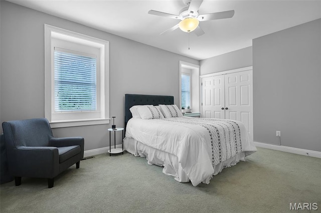1606 Mississippi Ave, Saint Louis, MO 63104 - carpeted bedroom with a closet, baseboards, and a ceiling fan