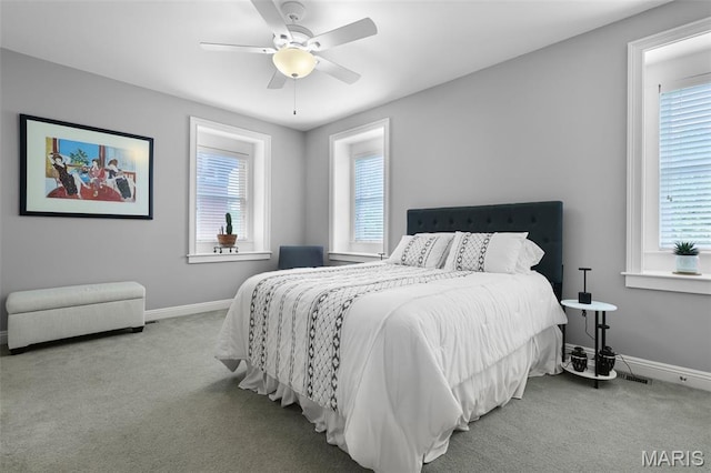1606 Mississippi Ave, Saint Louis, MO 63104 - carpeted bedroom with baseboards and a ceiling fan