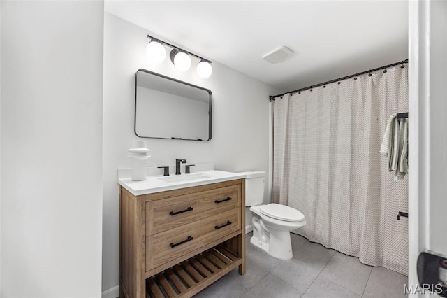 8917 Cardinal Ter, Saint Louis, MO 63144 - full bath with toilet, tile patterned flooring, vanity, and a shower with curtain