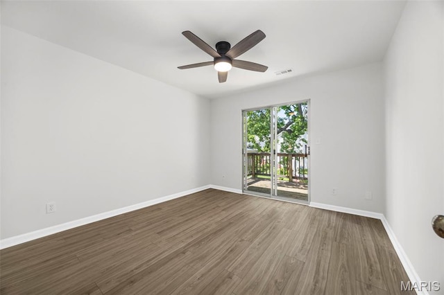 8917 Cardinal Ter, Saint Louis, MO 63144 - unfurnished room with dark wood-type flooring, baseboards, and a ceiling fan