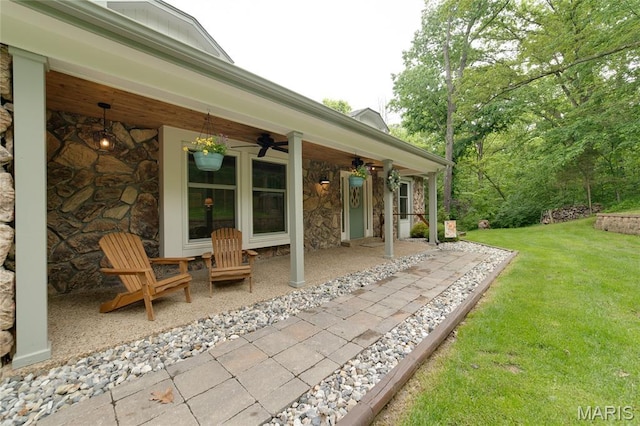 view of patio / terrace featuring a ceiling fan