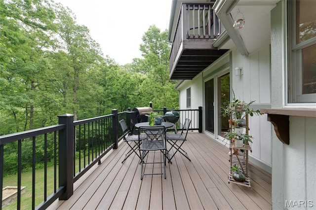 deck featuring outdoor dining space