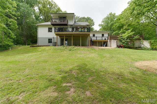 rear view of house featuring a wooden deck, stairs, a yard, and central air condition unit