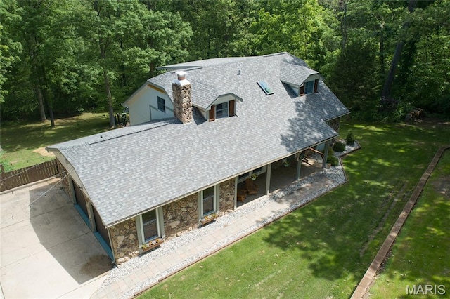 view from above of property featuring a forest