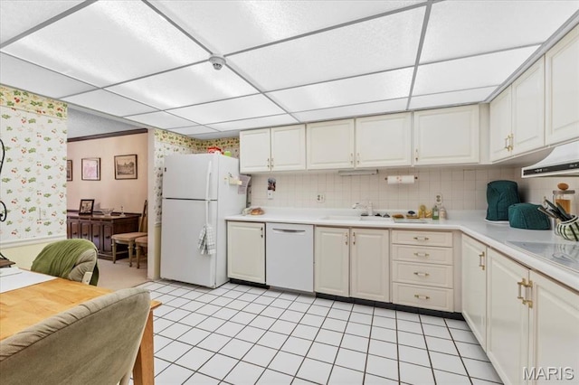 572 Coeur De Royale Dr Unit 105, Saint Louis, MO 63141 - kitchen featuring wallpapered walls, white appliances, a sink, light countertops, and white cabinets