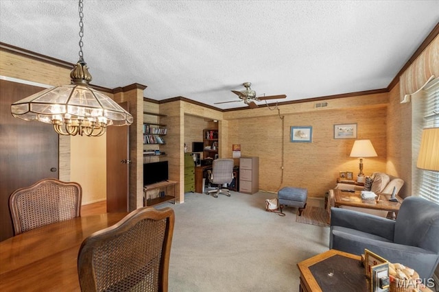 572 Coeur De Royale Dr Unit 105, Saint Louis, MO 63141 - carpeted living area featuring an office area, a chandelier, a textured ceiling, ceiling fan, and ornamental molding