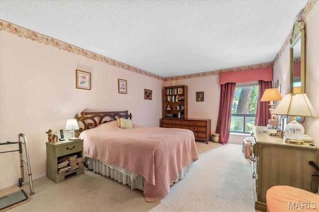 572 Coeur De Royale Dr Unit 105, Saint Louis, MO 63141 - bedroom featuring light carpet and a textured ceiling