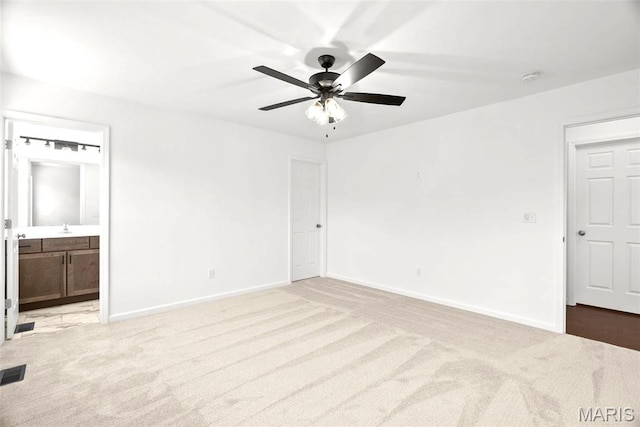 1909 Magnolia Way, Pevely, MO 63070 - unfurnished bedroom with carpet, ensuite bath, and a ceiling fan