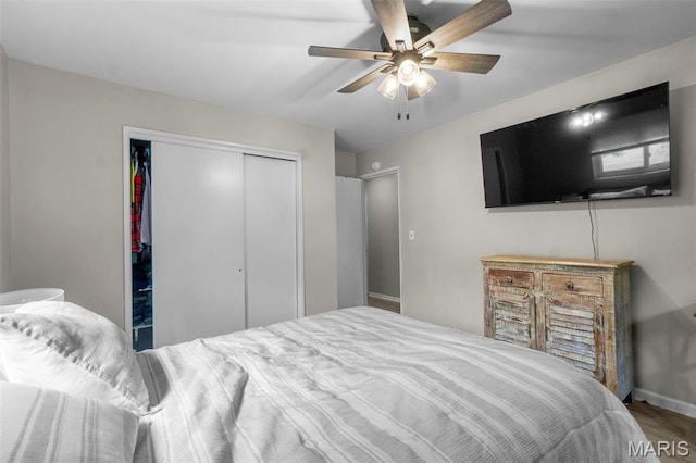 804 Harvard St, Sikeston, MO 63801 - bedroom featuring a closet, baseboards, wood finished floors, and ceiling fan